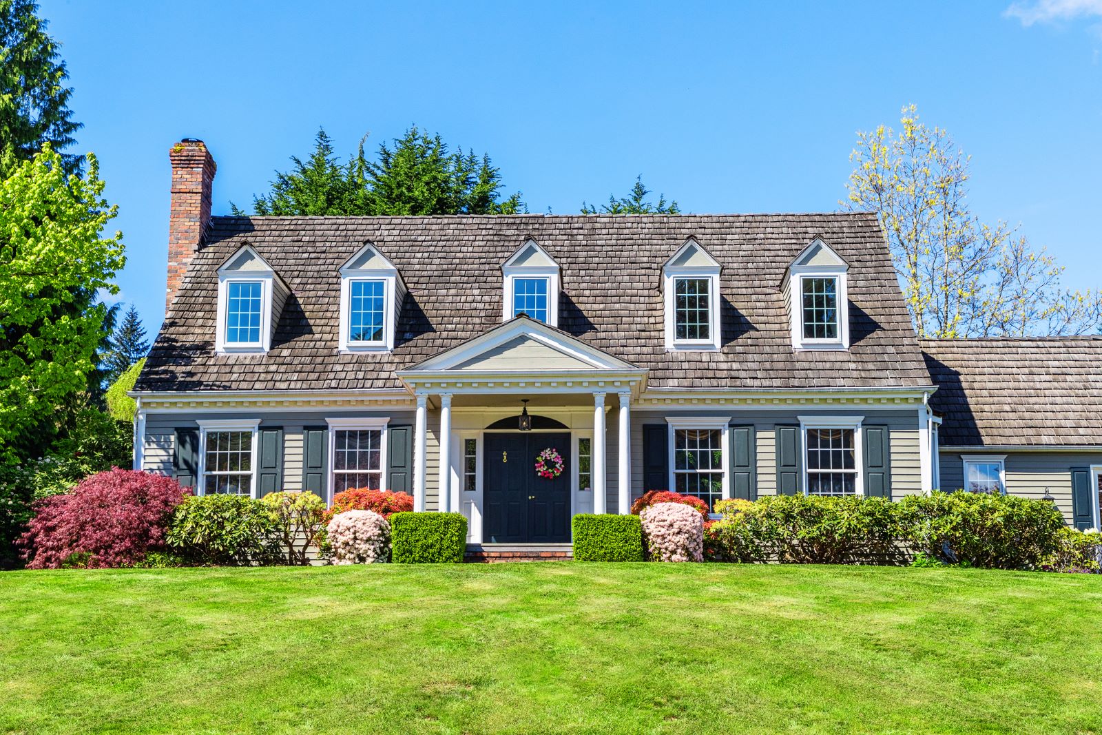 Cape Cod-style homes fit naturally into Carver’s wooded, rural setting.